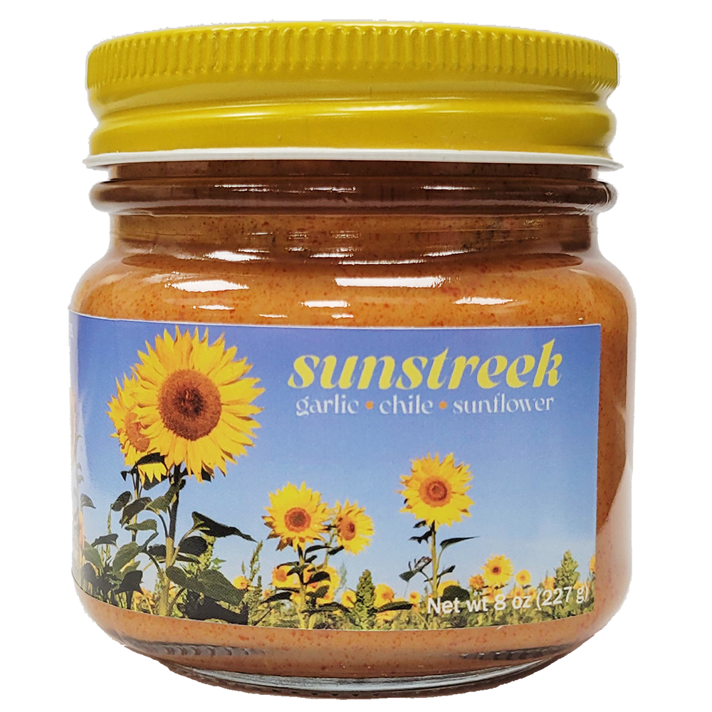 a jar of sunstreek chile-garlic-sunflower spread